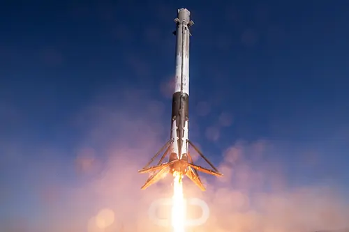 Spacex falcon-9 rocket launches with telecommunications satellites afloat